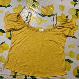 Cute yellow shirt with Gold chains as straps!